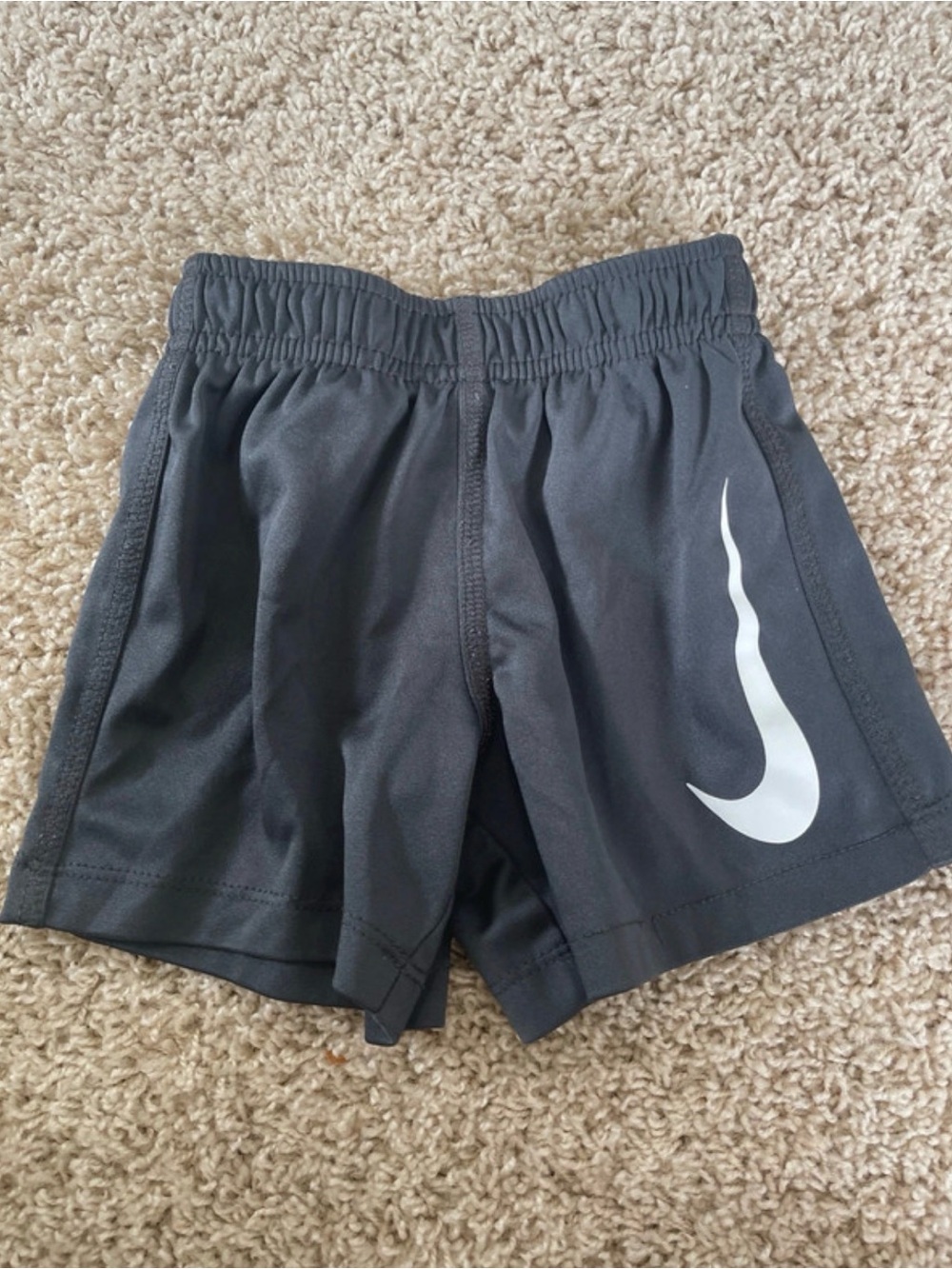 Nike Kids Black Shorts with White Swoosh